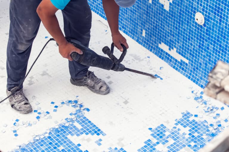 Removing tile in the pool, renovation work